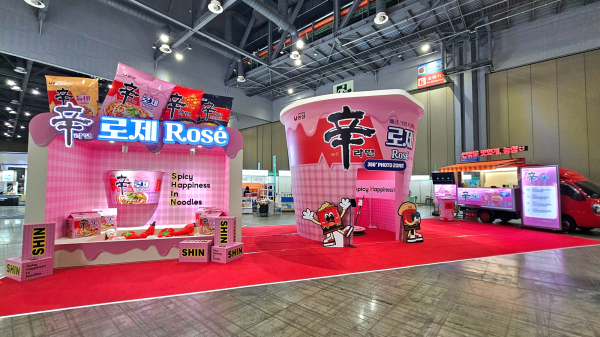 Nongshim is operating a dedicated booth themed around its new product, Shin Ramyun Rosé, at the 2026 MyK FESTA, held at KINTEX in Goyang from June 25 to 28/ Courtesy of Nongshim.