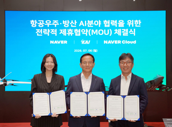From left, Naver CEO Choi Soo-yeon, KAI President and CEO Kim Jong-chul, and Naver Cloud CEO Kim Yu-won pose for a photo after signing a strategic memorandum of understanding on cooperation in aerospace and defense AI technologies at KAI headquarters in Sacheon, South Gyeongsang Province. / Courtesy of KAI